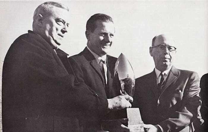 Frank Broyles with trophy